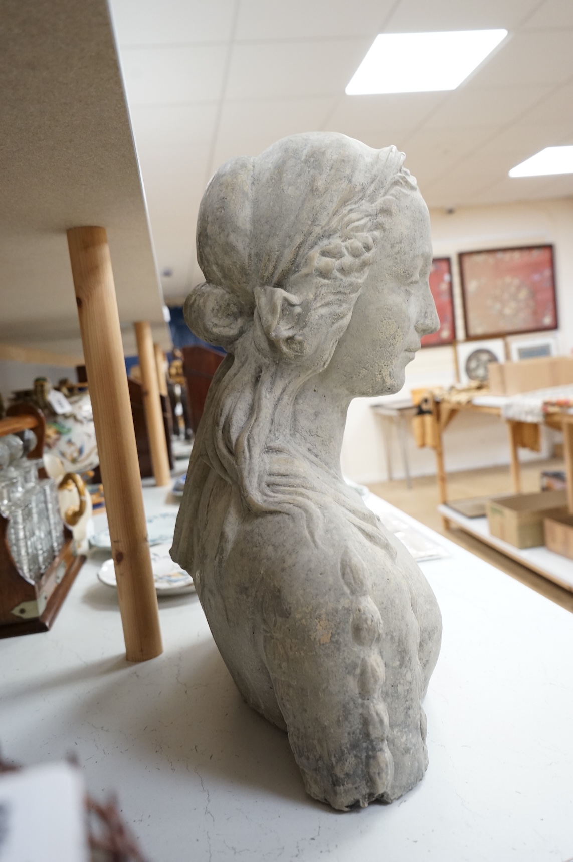 A composition stone bust of Madonna, 48cm high